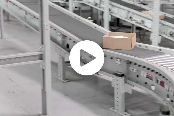 Conveyor belt in the Mouser warehouse with a box on it